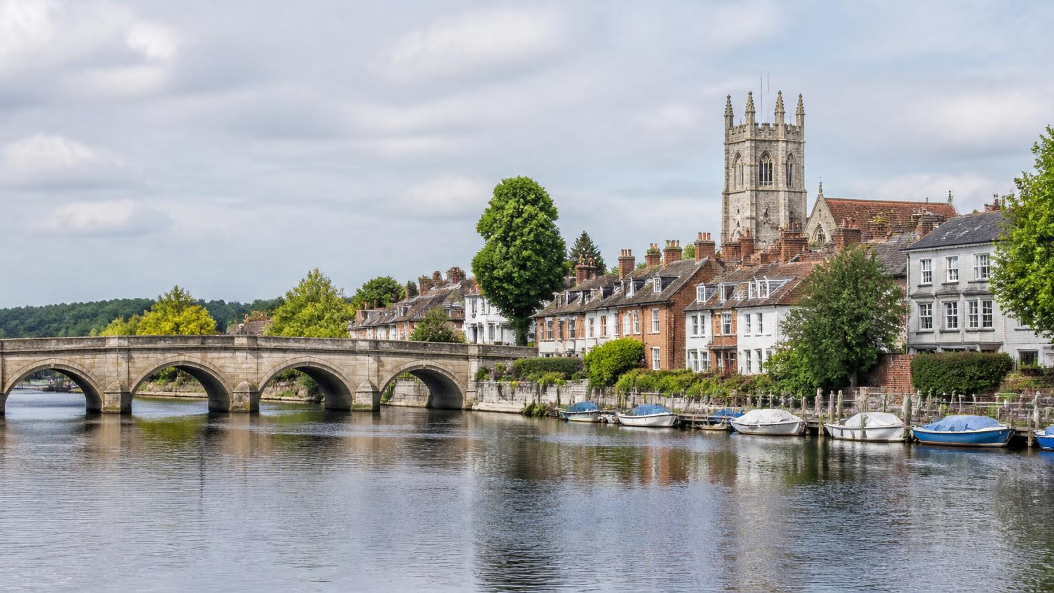 Henley-on-Thames: the stone road bridge, church tower and Georgian riverside townhouses